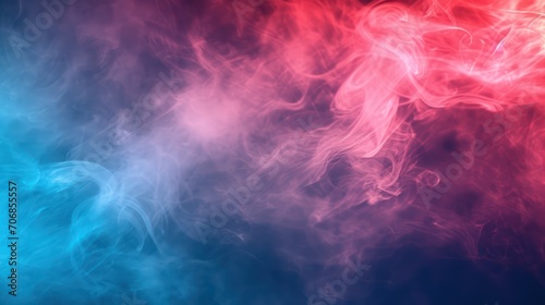 Colorful blue, pink and red smoke on a black isolated background. 