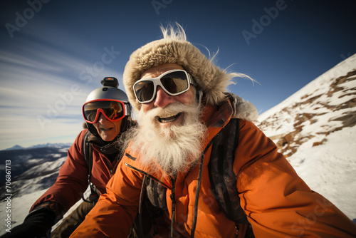 Active sport elderly healthy lifestyle concept. Selfie portrait of senior couple active smiling snowboarding skiing in glasses look happy on top of mountains winter day time, happily retired