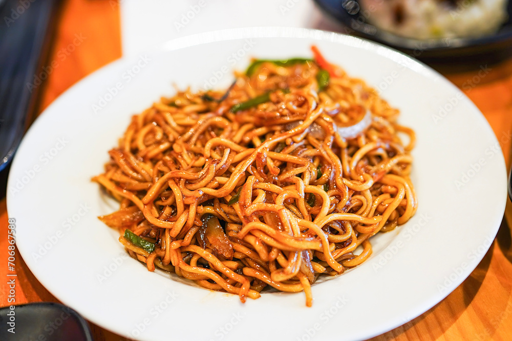Stir-fried yakisoba noodles with vegetables. Stir-fried yakisoba noodles with vegetables.