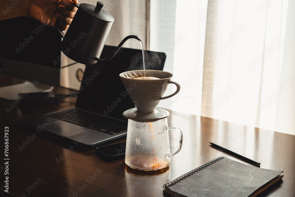 Drip coffee on your work desk in the morning Drip coffee on your work desk in the morning