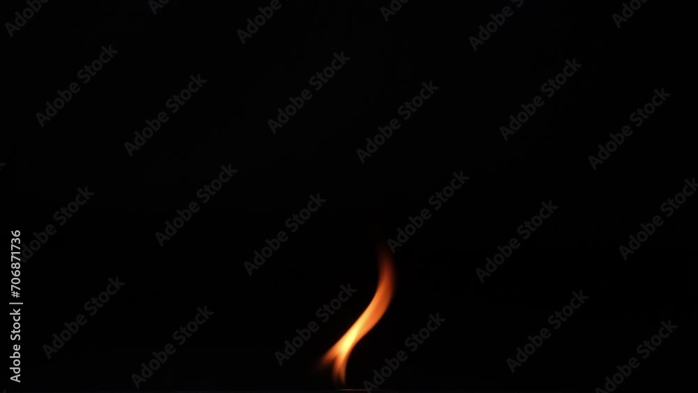 Hot flames on a black background. Beautiful flame of fire in the dark. Abstract of burning flames and smoke.