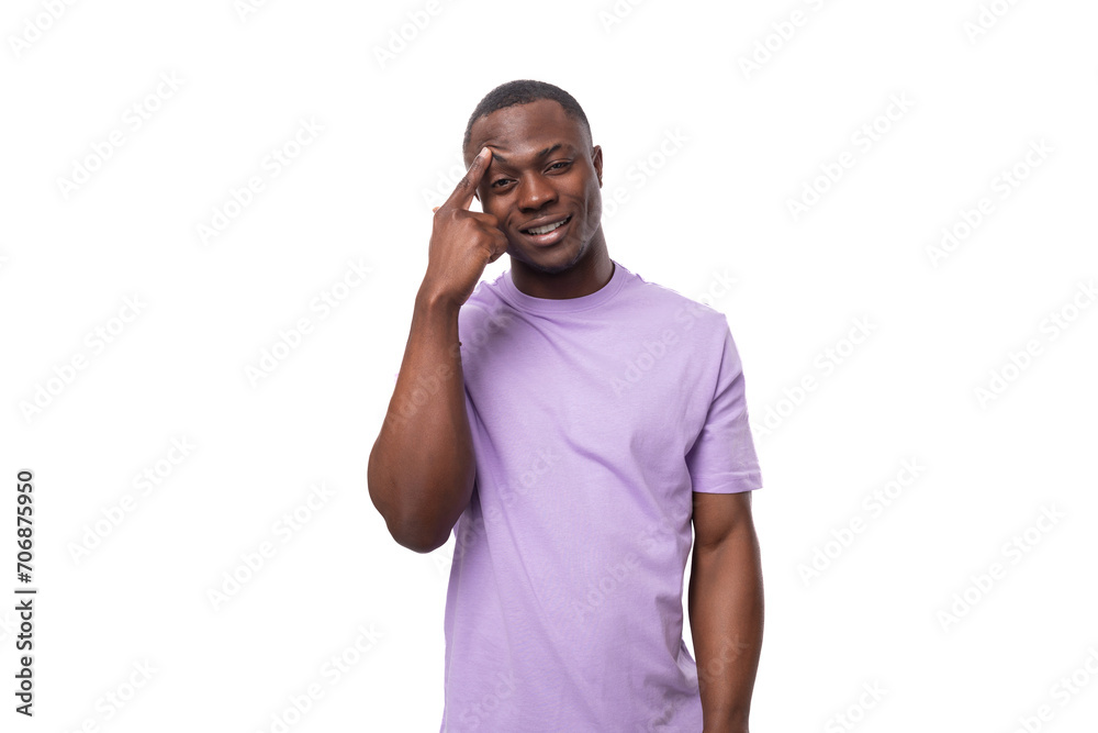 close-up portrait of a young pensive african man in a lilac t-shirt worried close-up portrait of a young pensive african man in a lilac t-shirt worried