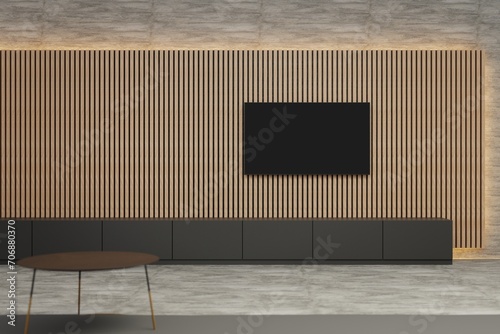 Fototapeta Naklejka Na Ścianę i Meble -  Flat screen TV on acoustic panel covered wall. Clean minimalist interior. Ambient lighting around acoustic panelling. Wide shot. Template for TV creative