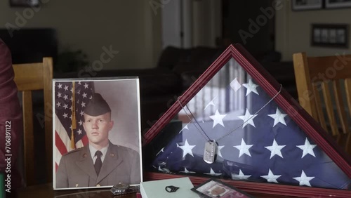 Military veteran reflects on his life in retirement - flag, uniform, memorial, service photo