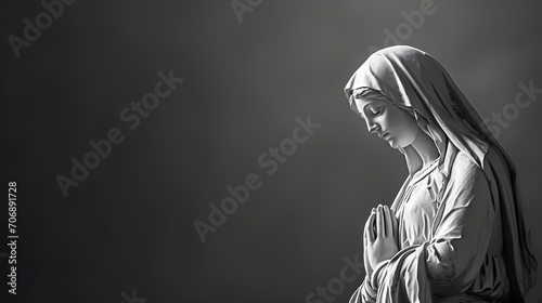 Christian Easter. Black and white image of a statue of the Virgin Mary. Space for text.