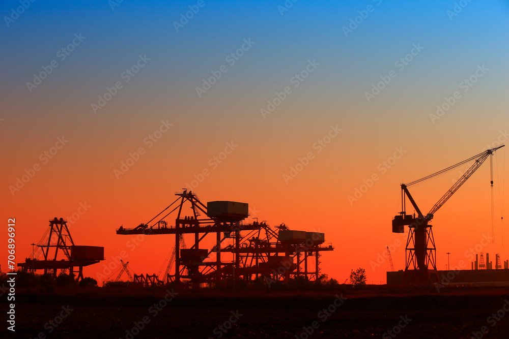 Port crane unloading container ships Port crane unloading container ships