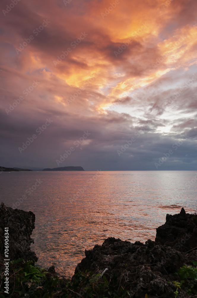 Fototapeta premium Cliff view of a twilight with colorful clouds. Iriomote Island