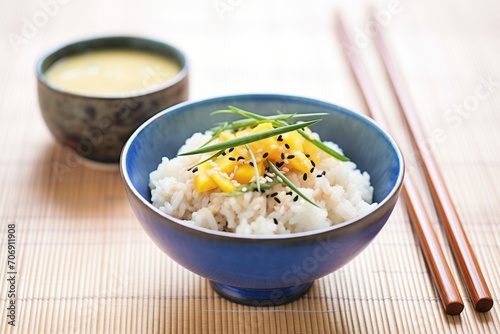 mango sticky rice with sesame seeds topping