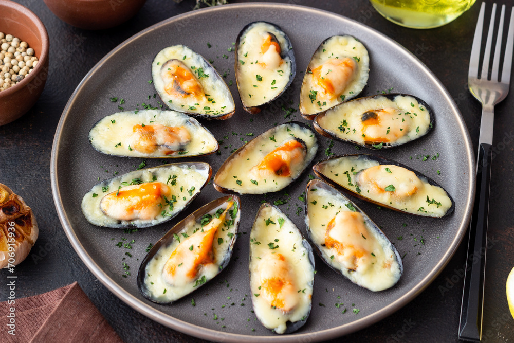 Baked mussels with cheese and herbs. Seafood. Healthy eating. Baked mussels with cheese and herbs. Seafood. Healthy eating.