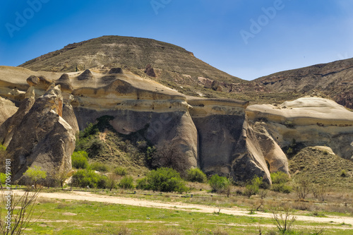Obraz na płótnie Cappadocia landscape soft volcanic rock, shaped by erosion into towers. w salonie