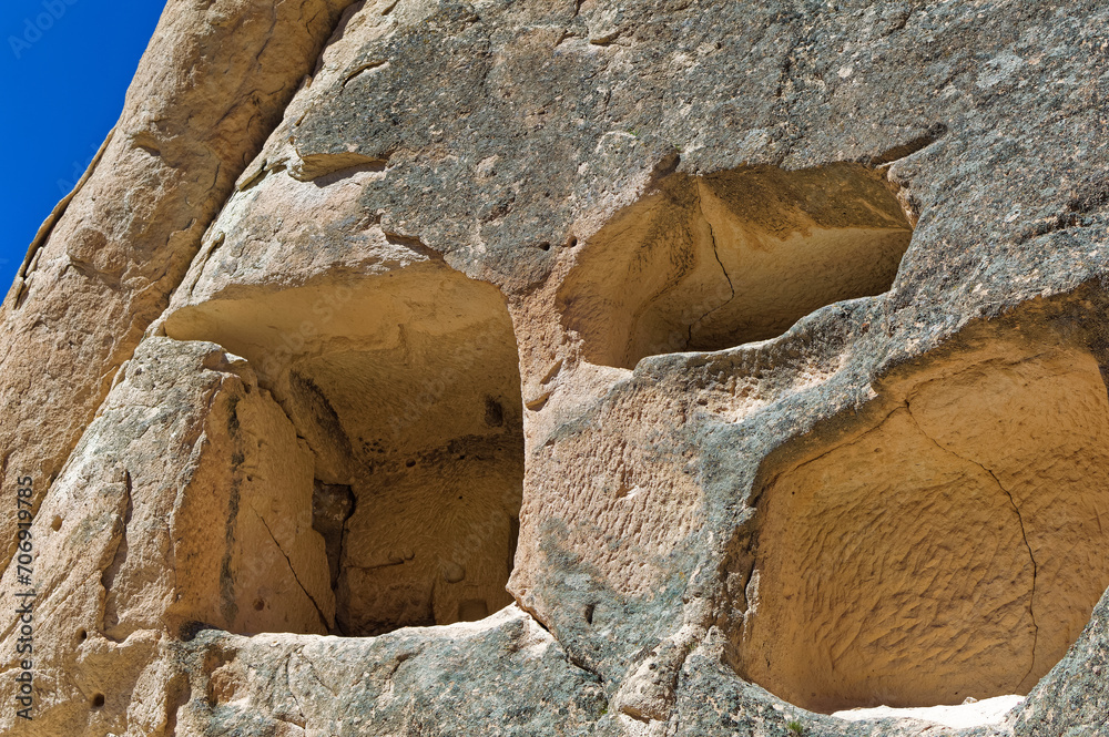 Cappadocia landscape soft volcanic rock, shaped by erosion into towers.