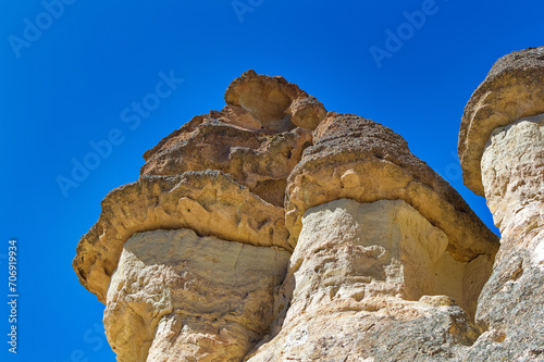 Obraz na płótnie Cappadocia landscape soft volcanic rock, shaped by erosion into towers. w salonie