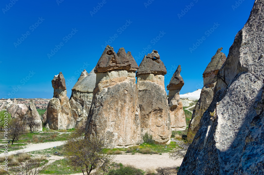 Cappadocia landscape soft volcanic rock, shaped by erosion into towers.