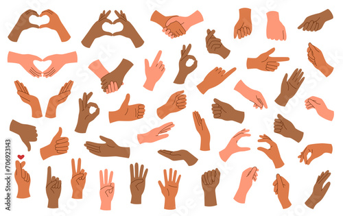 Set of hands of different skin tone with gestures isolated on white background.	