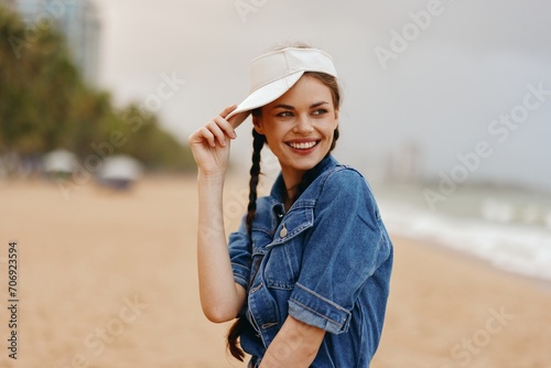 Happy Woman, Person of Beauty: A Young, Pretty Fashion Model Enjoying a Stylish Summer Vacation on a Beach © SHOTPRIME STUDIO