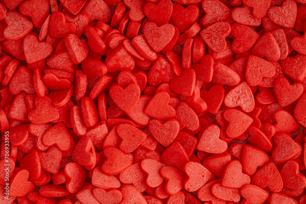 Red hearts background. Sweet candy hearts as background. Valentines day background - obrazy, fototapety, plakaty 