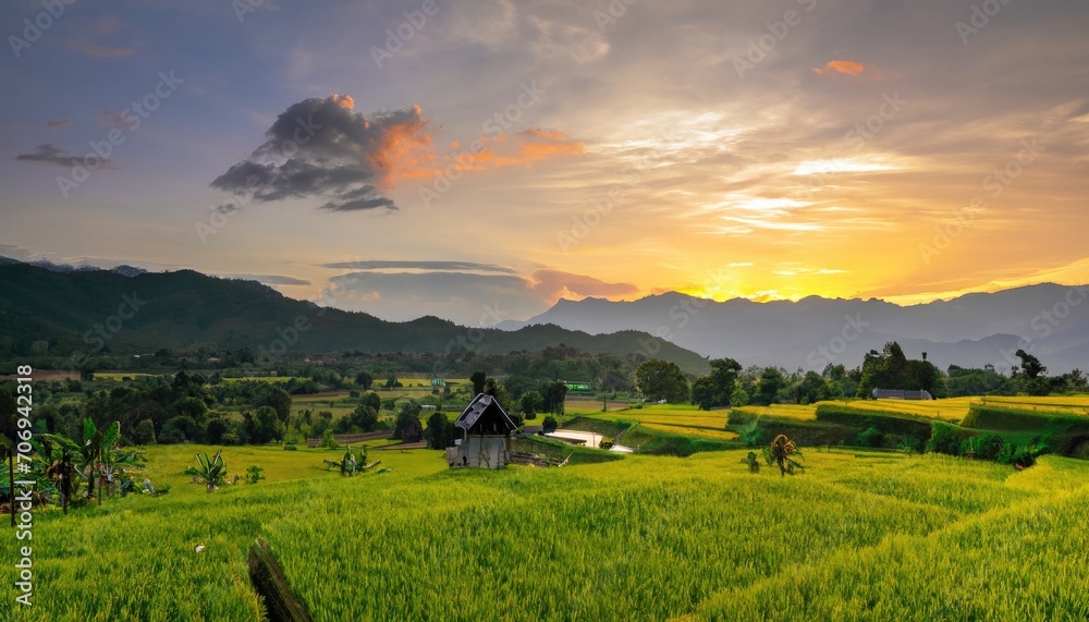 Asian scenery when the morning sun is beautiful over the mountains and green rice fields in the village Asian scenery when the morning sun is beautiful over the mountains and green rice fields in the village