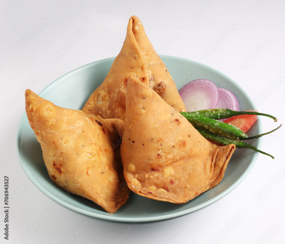 Samosa with onion and fried green chillies