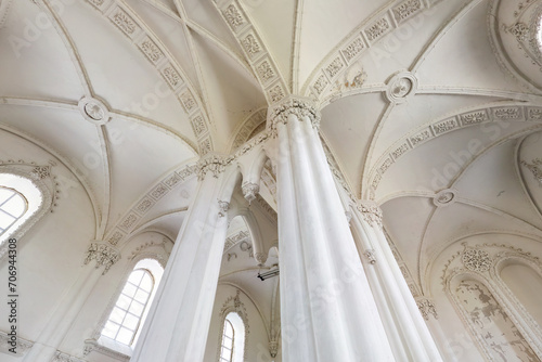 eclectic elements of the interior of a large choral Jewish synagogue with columns and decoration