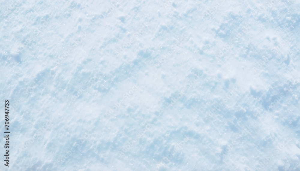 Top view of snowy surface background, snow texture.