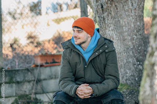 young man bundled up in winter outdoors