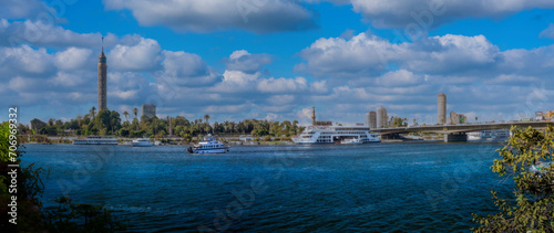 Expansive River View Featuring Boats, City Skyline, Likely Cairo Scene