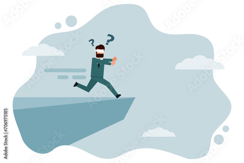 A blindfolded businessman runs towards a cliff. The concept of traveling without a plan or goal can lead to disaster or danger. A businessman who runs towards failure without realizing it. © Apirak