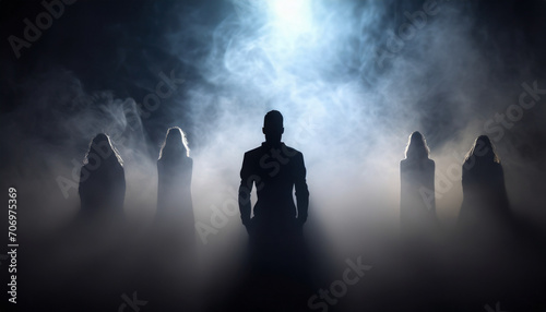 Silhouette of ghosts,people spirits on a dark background. And his shadow in smoke.death day concept, copy space.