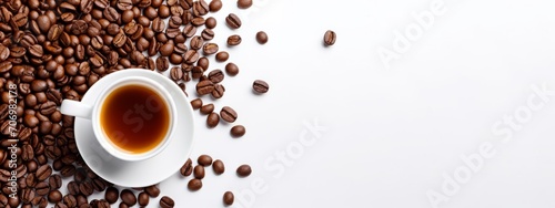Cup of coffee and coffee beans border isolated on white background banner panorama, top view, flat lay