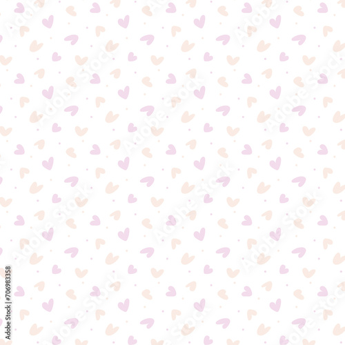 Seamless Pattern of pink and peach hearts spread on a white background