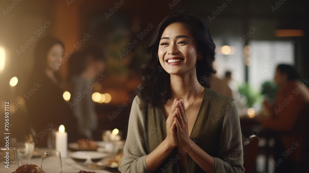Woman Applauding Amidst Soft Focus and Cinematic Ambiance at Dinner Party