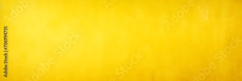 Yellow rough wall background banner. Grunge yellow wall texture backdrop.