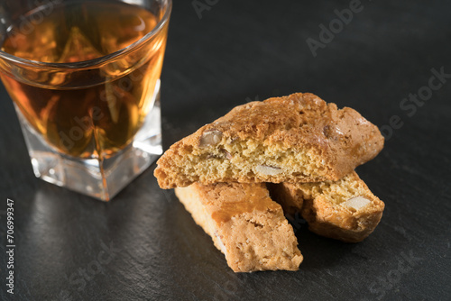 Detail of Cantuccio almond biscuits with Vino Santo, a typical dessert of Florence and of the Tuscan tradition in Italy