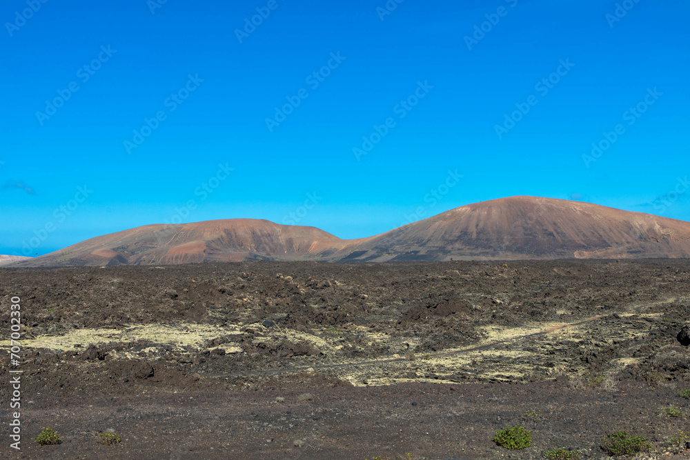 Φωτογραφία Spectacular views of the Fire Mountains at Timanfaya National Park, this unique area consisting entirely of volcanic soils