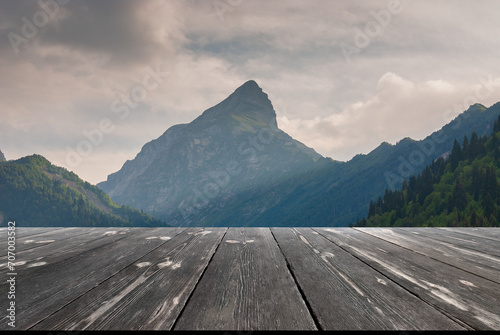 Beautiful mountains with empty wooden table. Natural template landscape