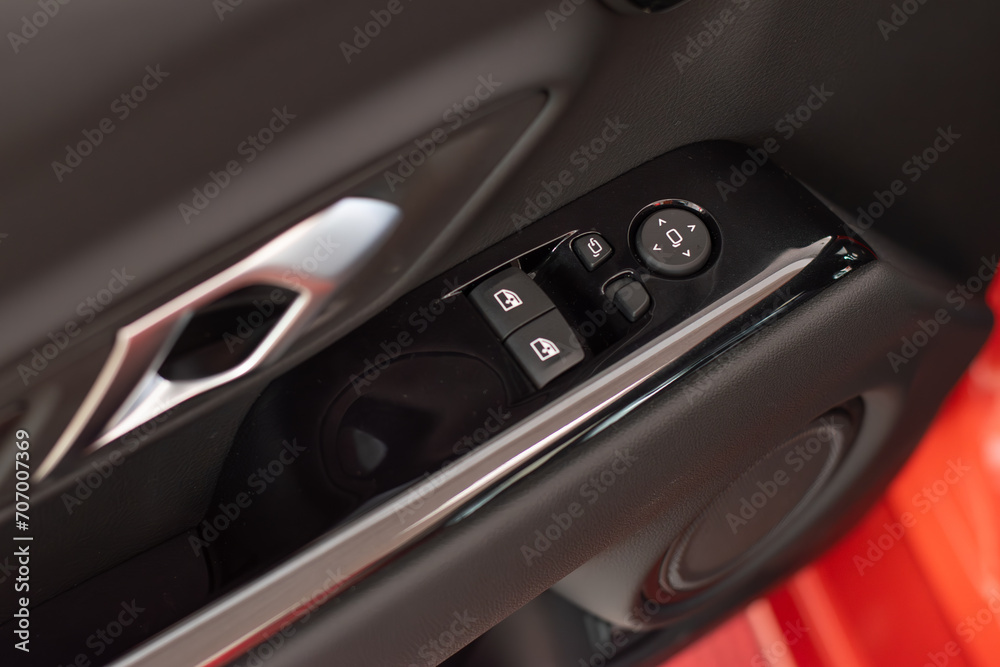 Close up view of modern automobile's door. Buttons and knobs Close up view of modern automobile's door. Buttons and knobs