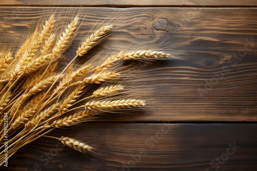 Golden wheat on rustic wooden background