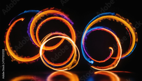 Abstract art of long exposure flame dancing on the black background