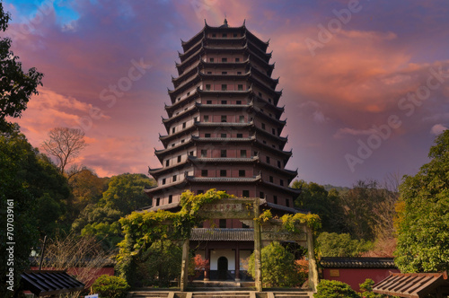 Majestic Multi-Tiered East Asian Pagoda at Sunrise or Sunset, Serene Natural Setting, Tranquil Travel Destination photo