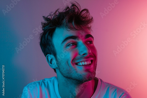 Fashion young man in studio giving pose on isolated color background