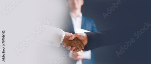 men or business people shaking hands with partner to greeting or dealing business, conflict dealing and resolution between the differences concept photo