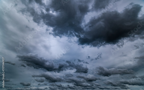 Dark sky with stormy clouds. Dramatic sky rain,Dark clouds before a thunder-storm. © pinglabel