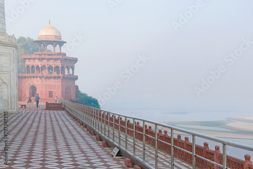 Masjid of Taj Mahal complex. Scenic view before sunrise, with mist over Yamuna (Jamune) river. Agra, Uttar Pradesh, India photo