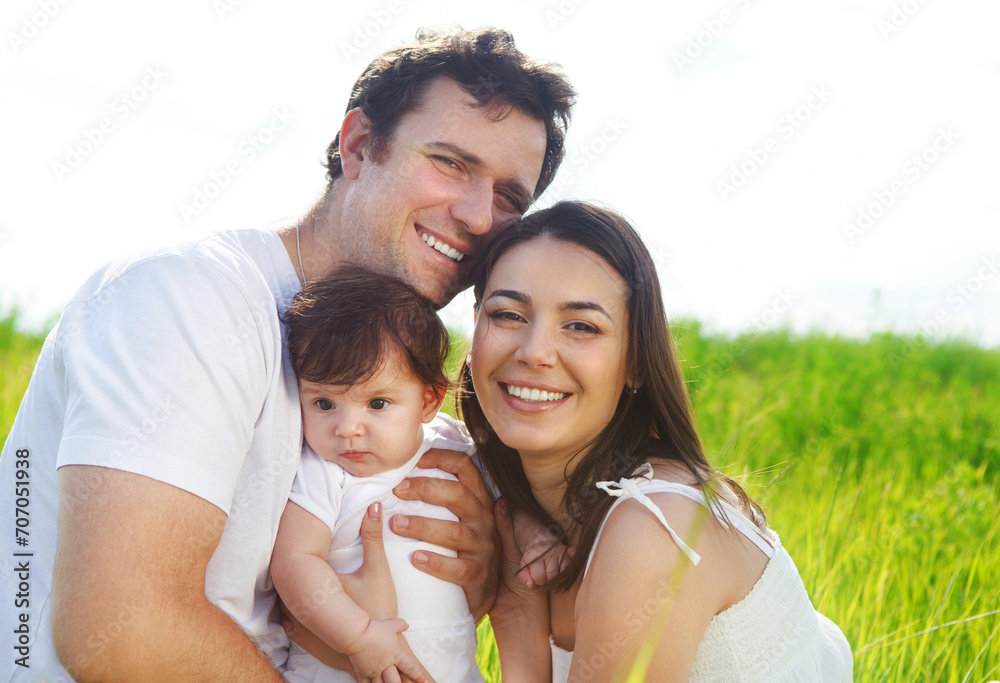 Happy young family with little baby girl Happy young family with little baby girl