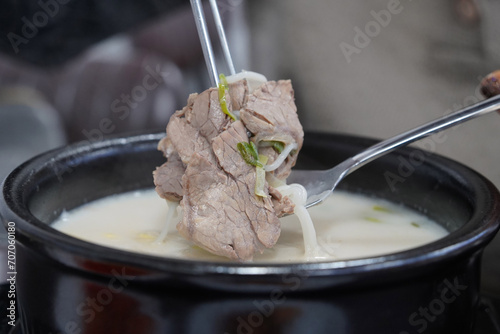 A thick soup made of beef, shank bones, and knucklebones gently simmered for hours. Rich in protein and calcium, beef bone soup is a great restorative food for postpartum mothers and elderly patients. photo