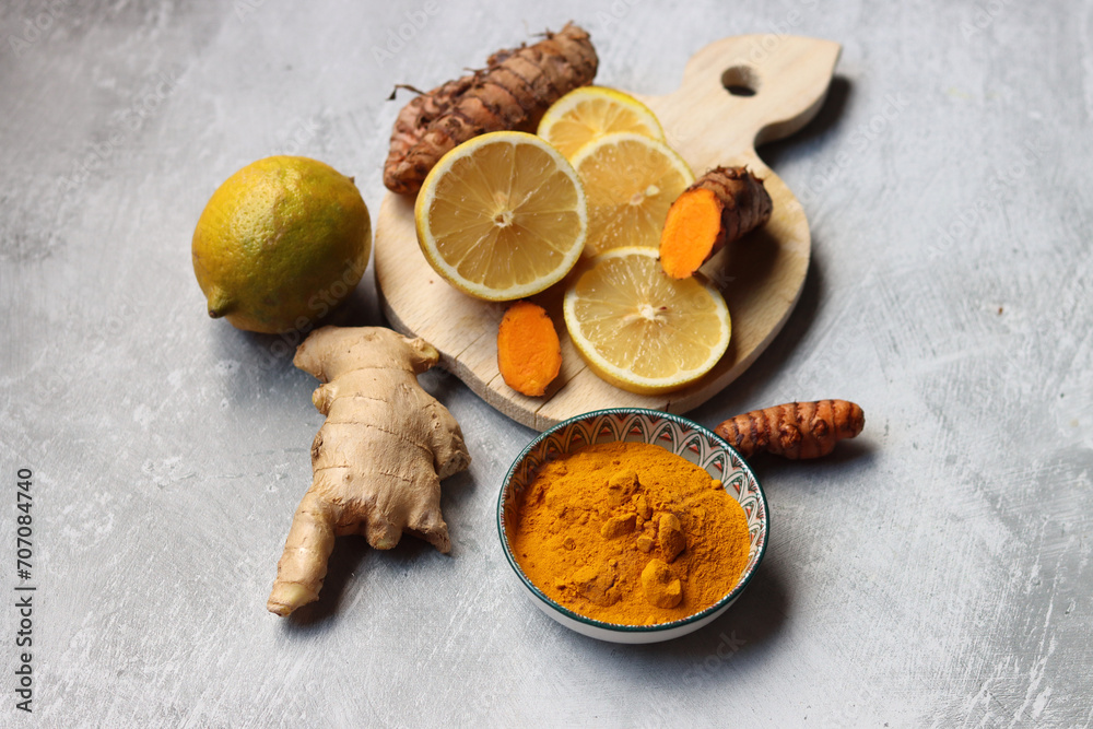 Detox cocktail ingredients on a table. Top view photo of lemon, ginger and turmeric. Alternative medicine concept. Detox cocktail ingredients on a table. Top view photo of lemon, ginger and turmeric. Alternative medicine concept.