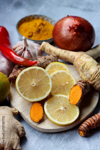 Detox cocktail ingredients on a table. Top view photo of lemon, ginger and turmeric. Alternative medicine concept. 