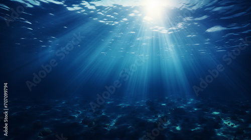 seamless loop of deep blue ocean waves from underwater background, light rays shining through, Abstract image of Tropical underwater dark blue deep ocean wide nature background with sunlight, Ai 