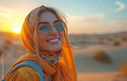Happy girl in the desert of the Arab Emirates. © tongpatong