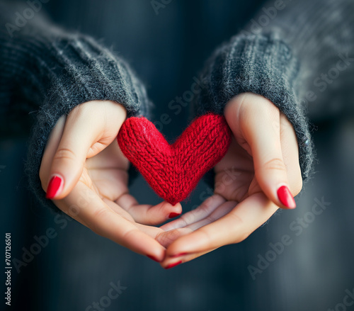 Tender Love and Care: Closeup of Female Hands Holding a Handmade Heart, Symbolizing Affection and Connection, Perfect for Valentine's Day and Crafts
